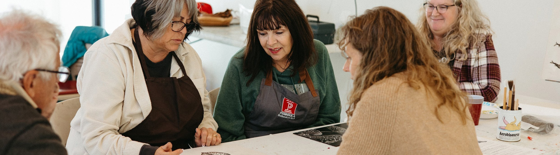 people reviewing photos